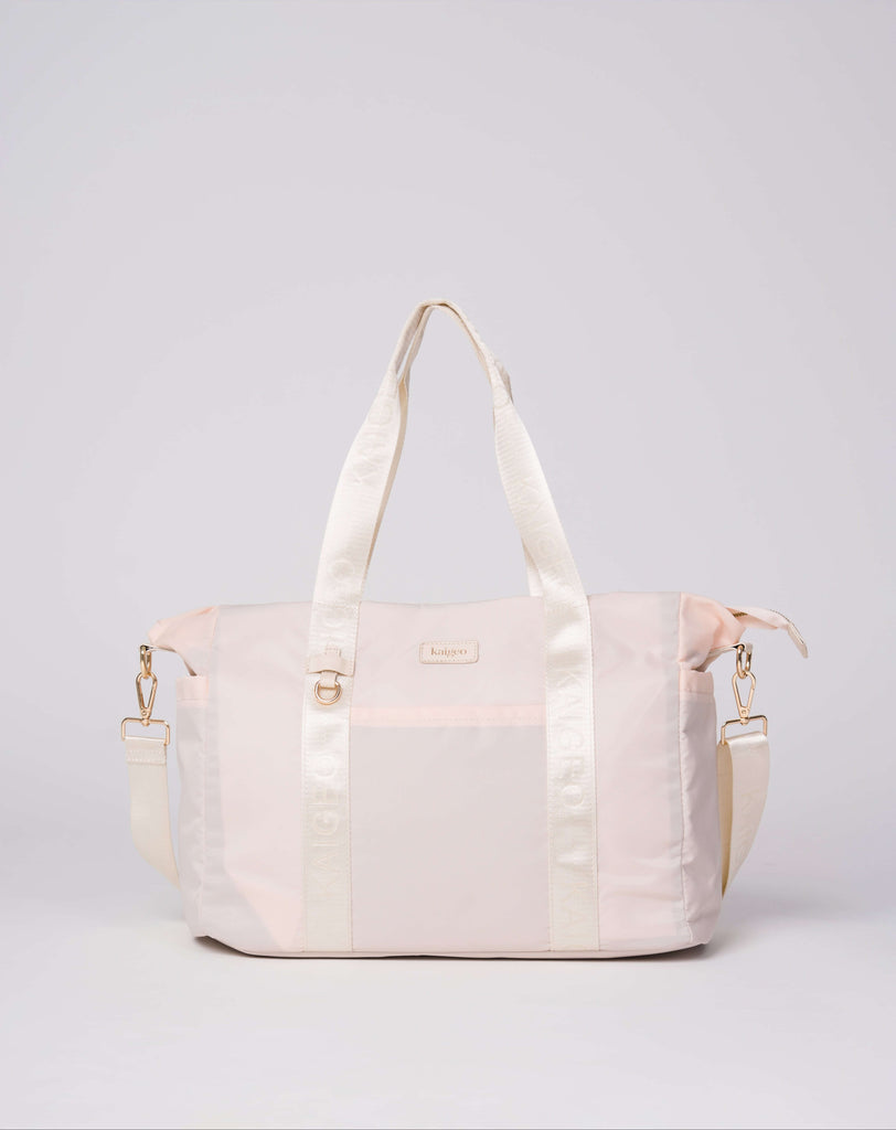 Kaigeo Blush travel tote with luggage sleeve
